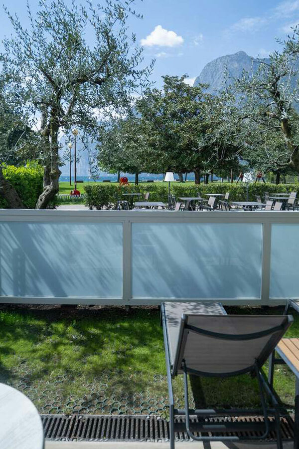 Hotel Bellariva 4 stars Riva del Garda – Lakefront View & Adults-Friendly Hospitality Bellariva srl | Superior Ground Floor with terrace overlooking the beach