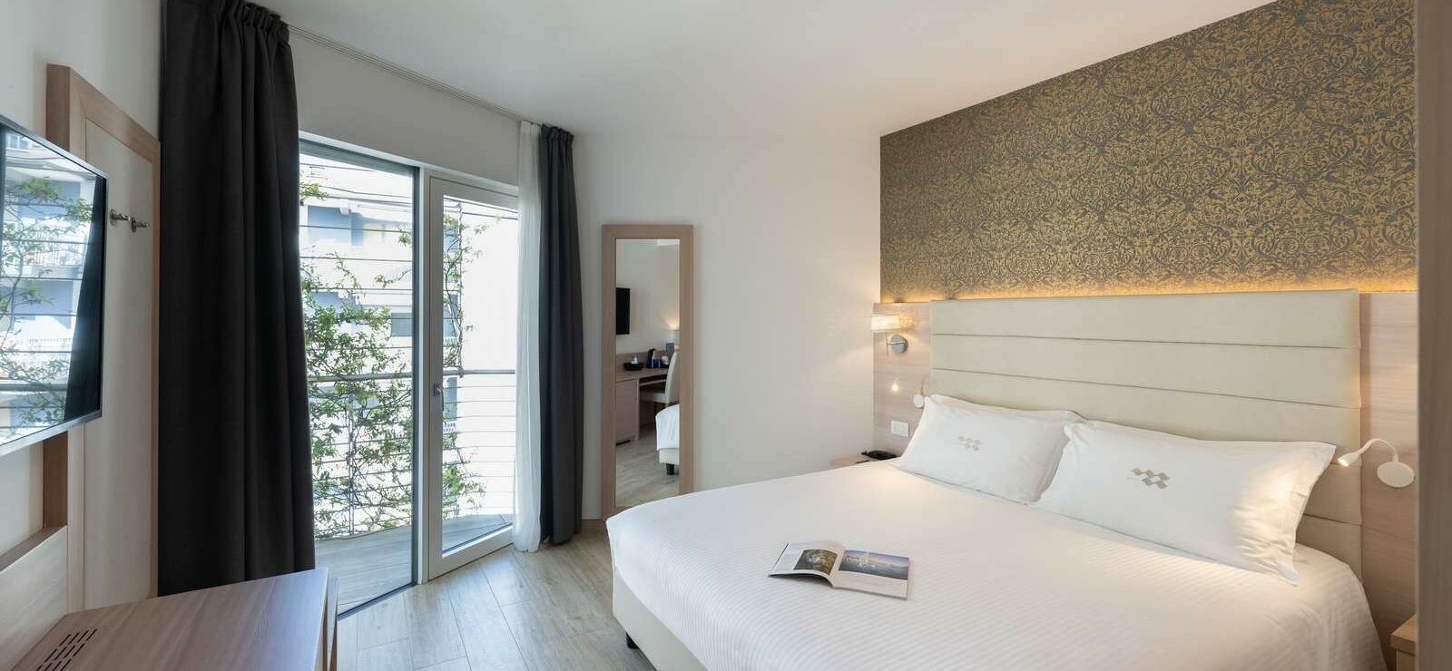 Comfort Room with balcony and partial lake view