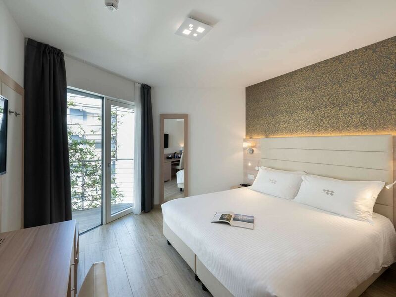 Comfort Room with balcony and partial lake view