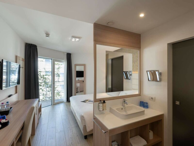 Comfort Room with balcony and partial lake view