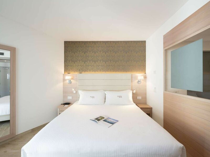 Comfort Room with balcony and partial lake view