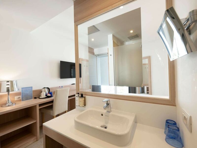 Comfort Room with balcony and partial lake view