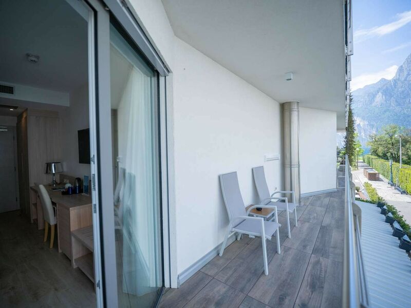 Comfort Room with balcony and partial lake view